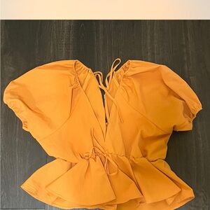 Women's Orange Peplum Top